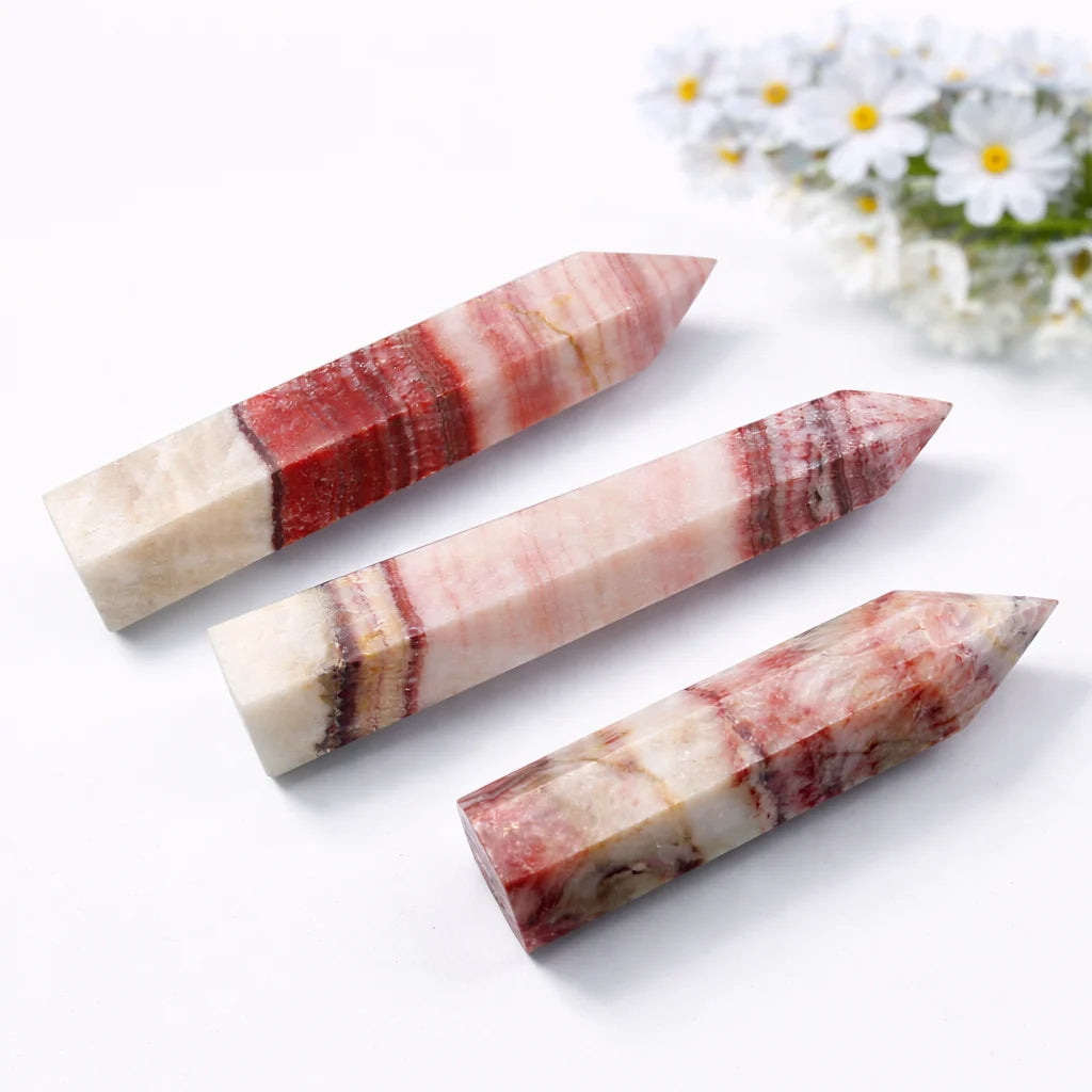 Polished Dali jasper point featuring unique earthy stripes, clean white backdrop with subtle shadow