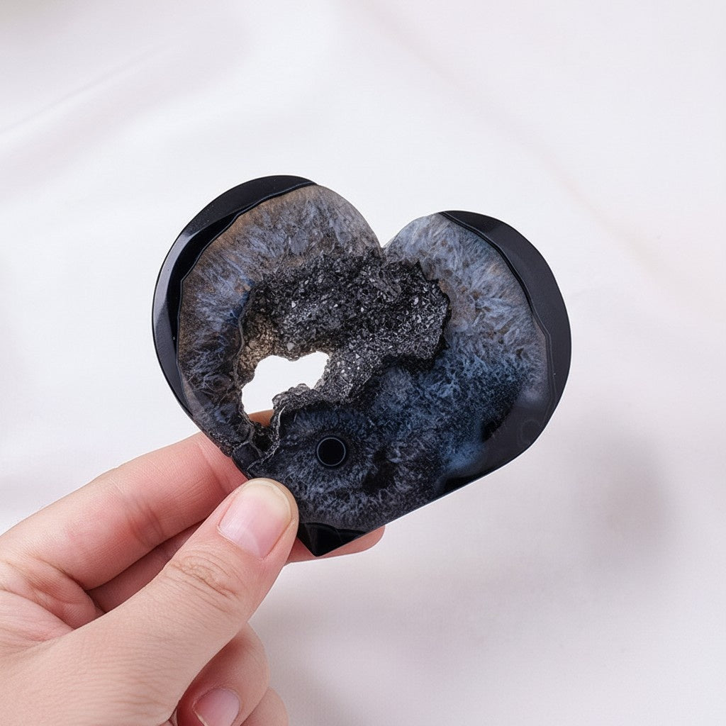 Polished lack Agate Geode Heart Crystals Bulk Wholesale crystal close-up